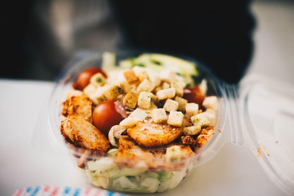 healthy meal prep containers with chicken and vegetables