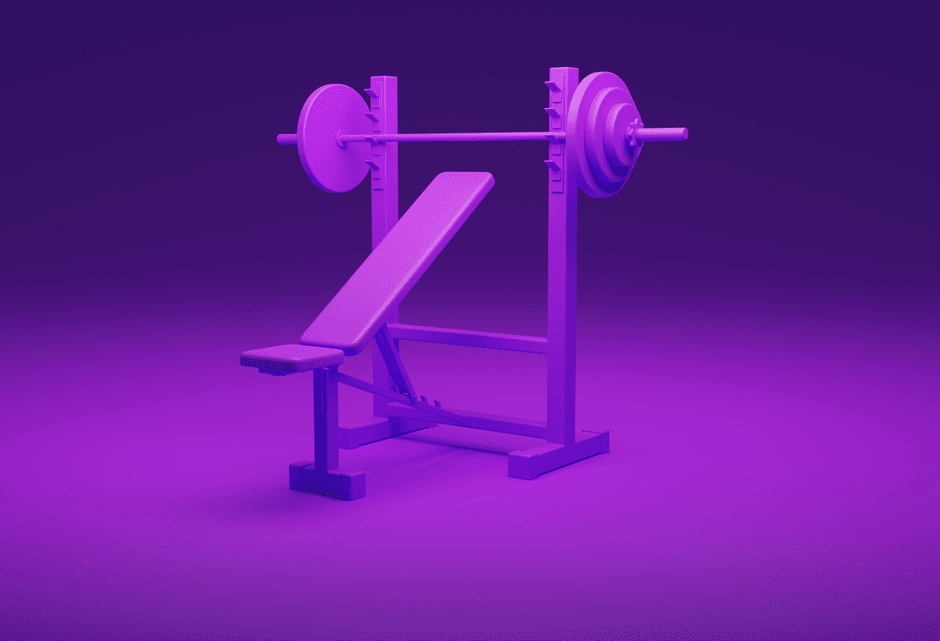A lifter pressing a barbell with proper bench press form