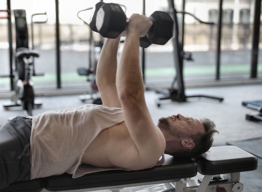 Close-up of a lifter's elbow angle during a bench press