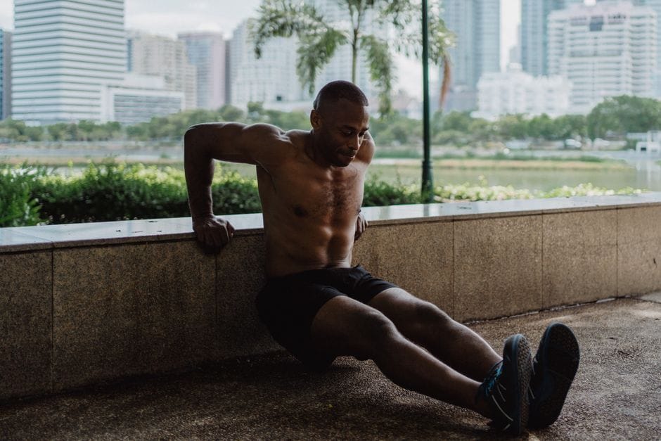 Close-up of proper elbow tracking during a tricep dip
