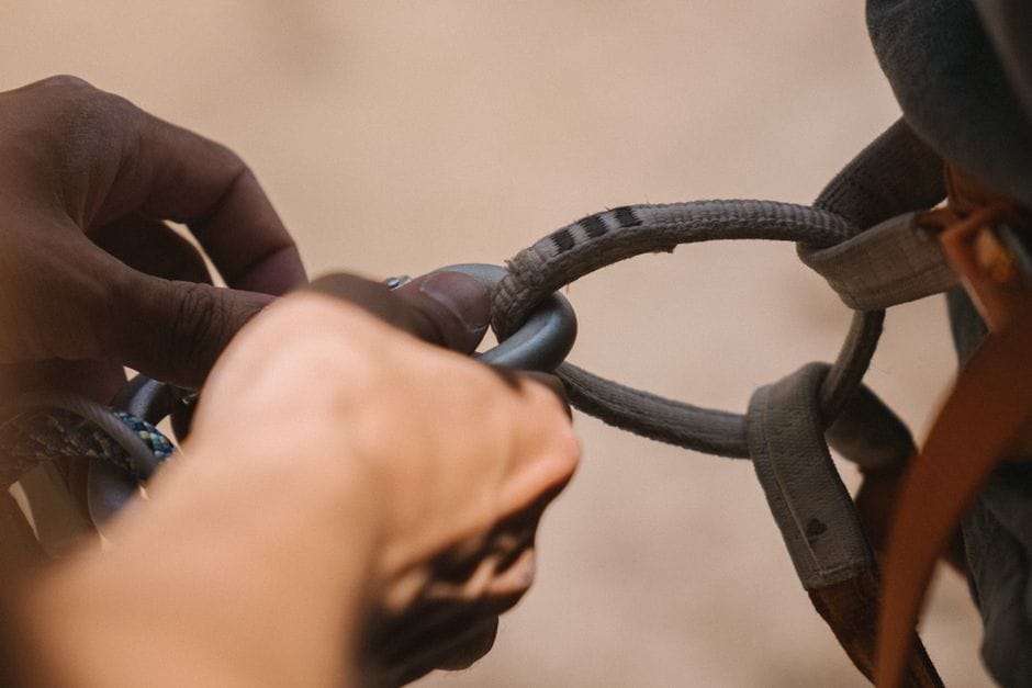 Close-up of hands gripping a rope attachment during a tricep pushdown
