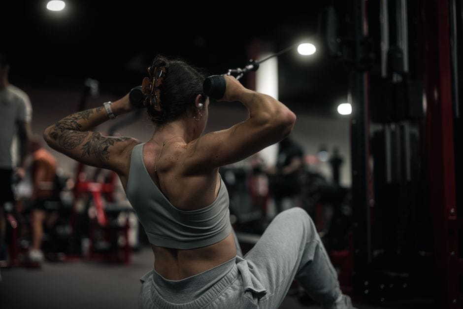 Close-up of the contracted position in a seated cable row with shoulder blades squeezed together